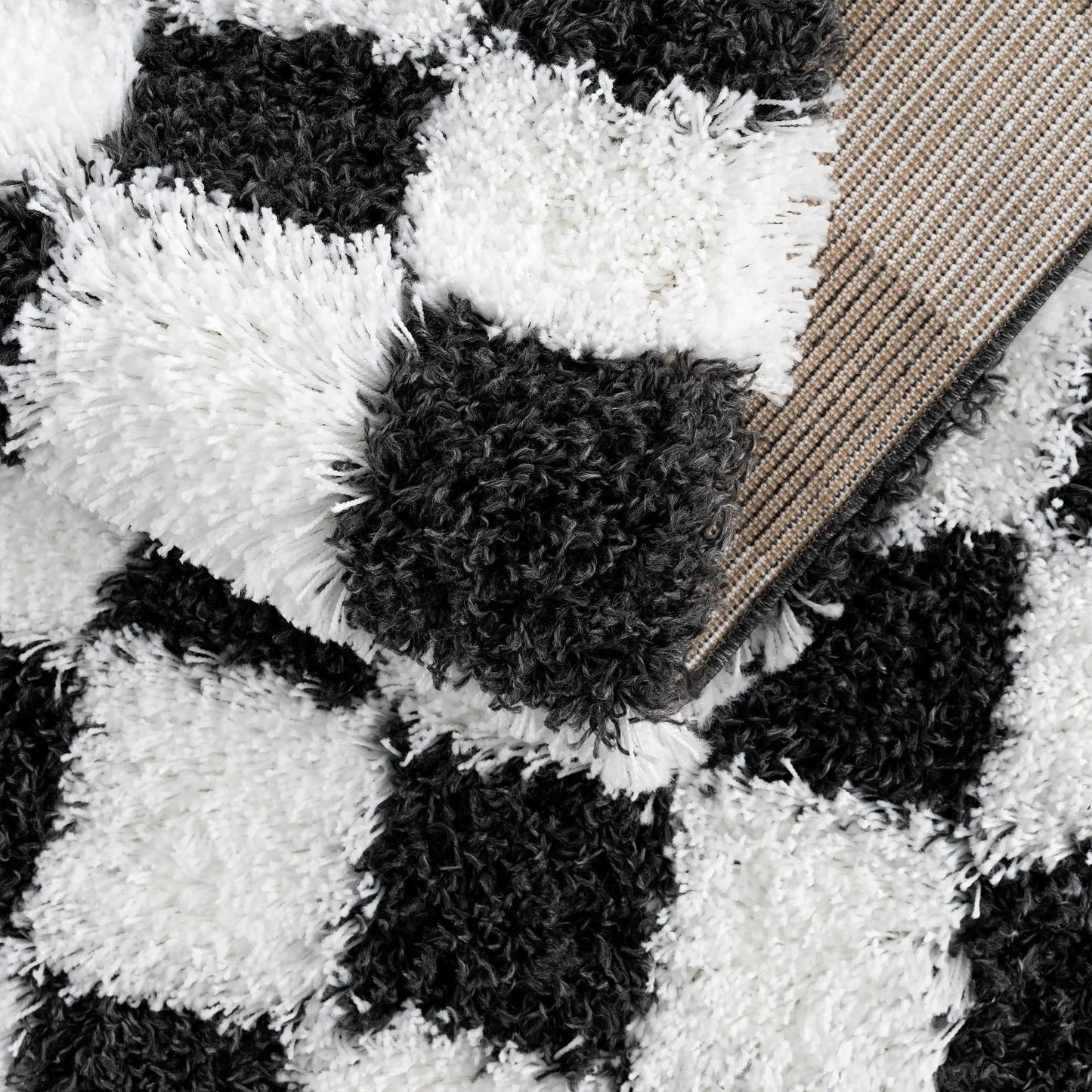 Atira Black & White Checkered Area Rug from PriceLows™