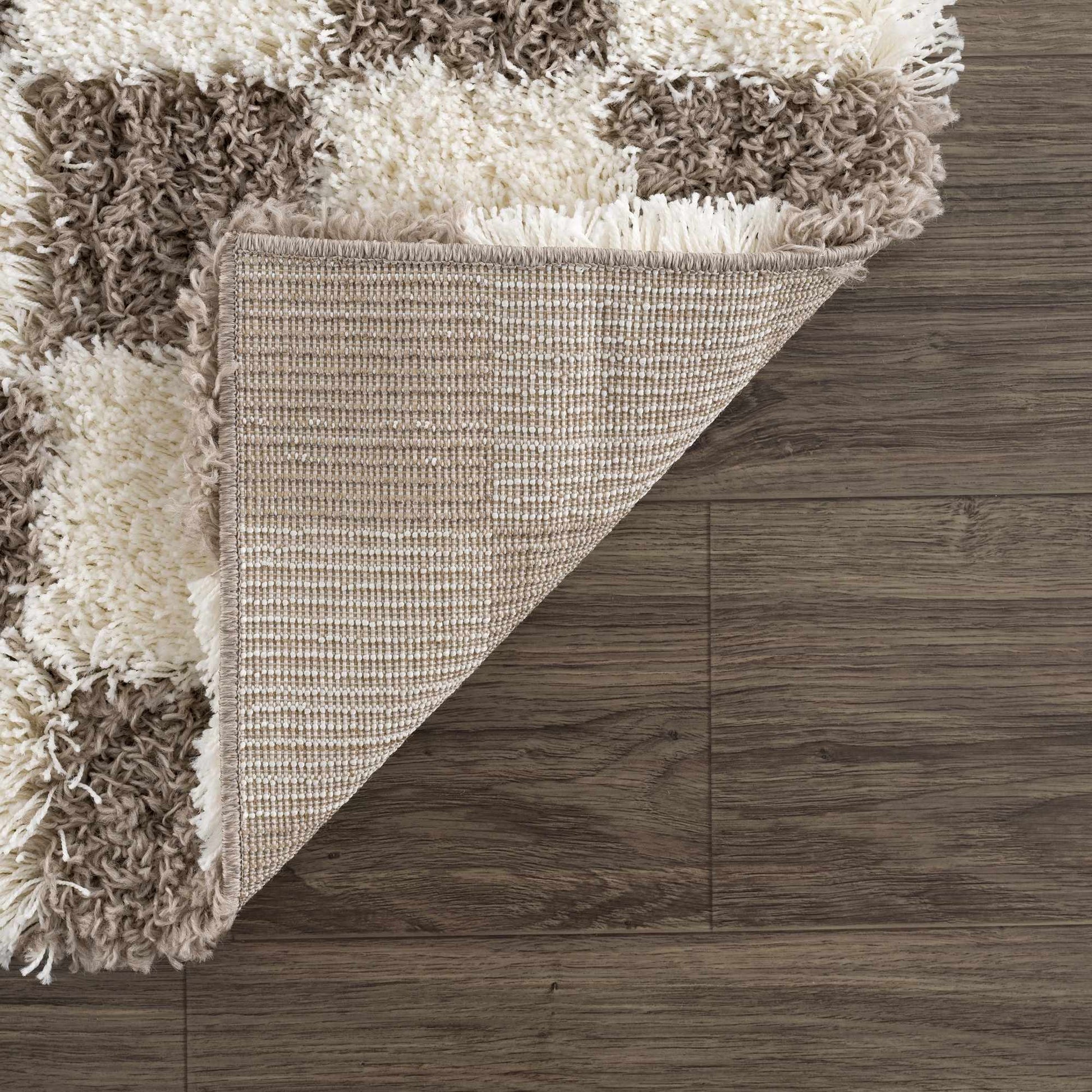 Atira Brown Checkered Area Rug from PriceLows™