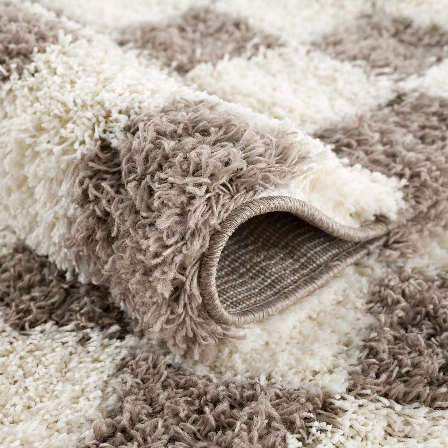 Atira Brown Checkered Area Rug from PriceLows™