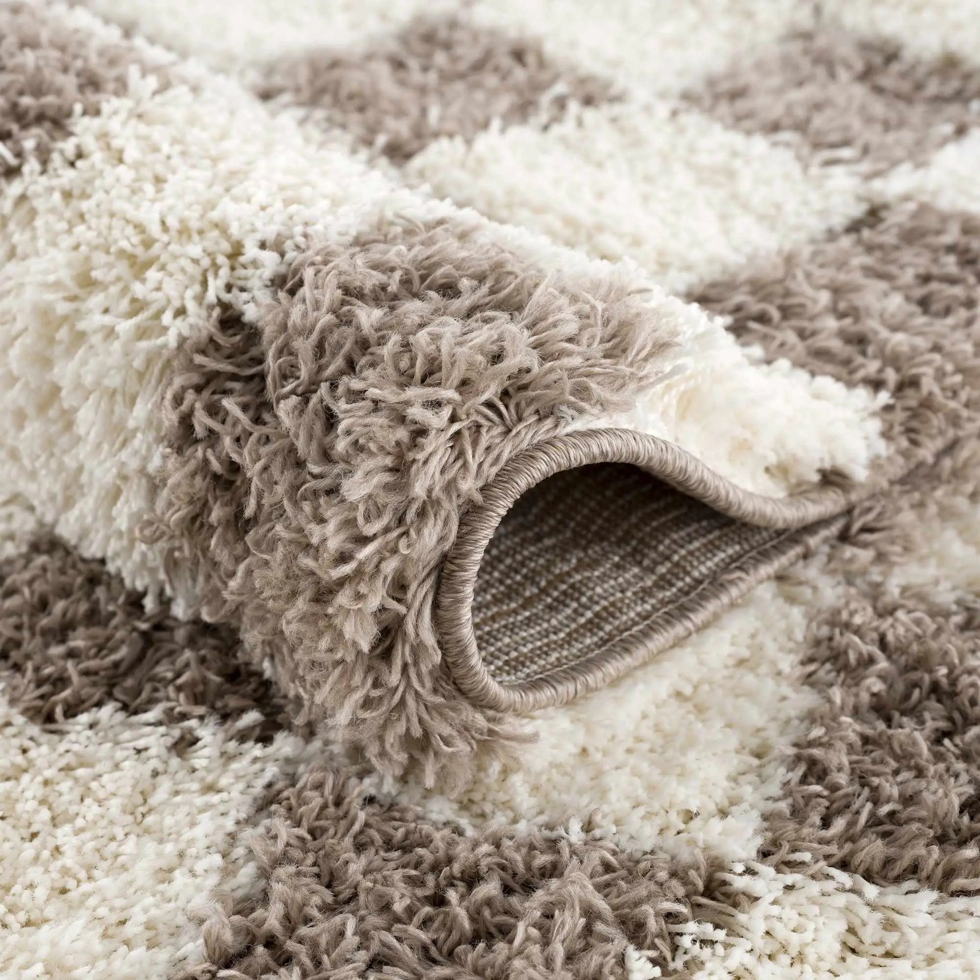 Atira Brown Checkered Area Rug from PriceLows™
