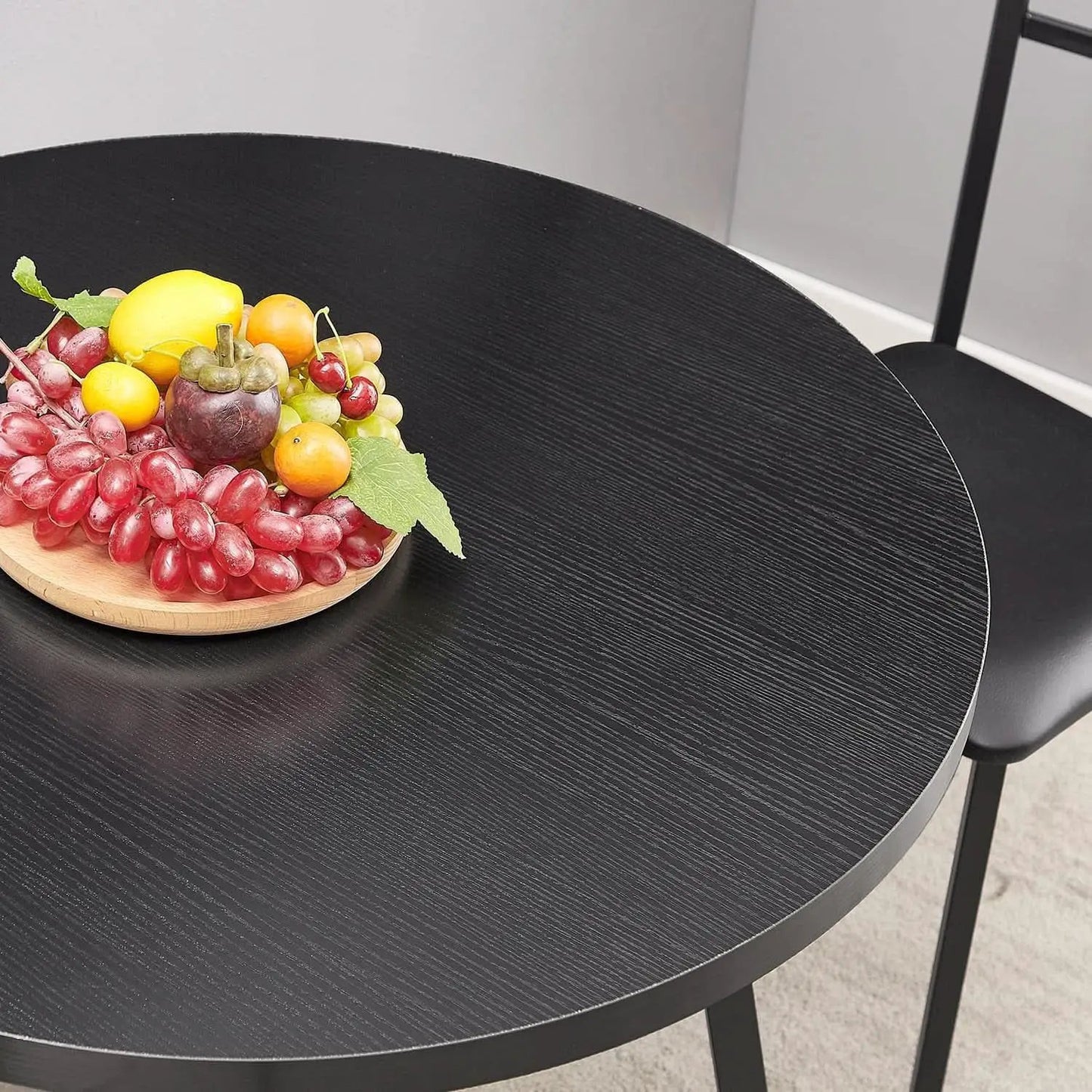 Round Black Woodgrain Top Dining Table With Steel Frame from PriceLows™