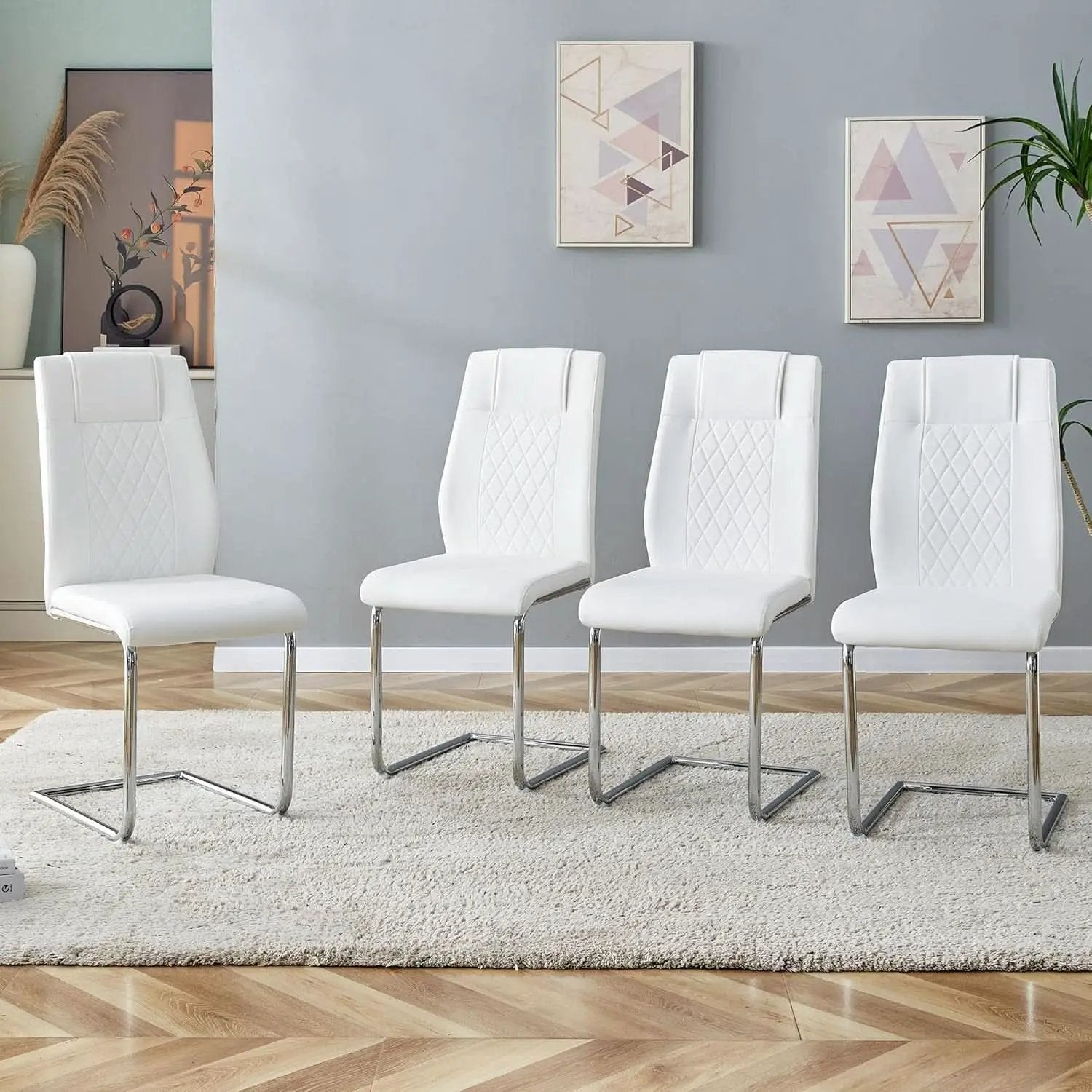 White Faux Leather Dining Chairs Four Pack Chrome Finish from PriceLows™
