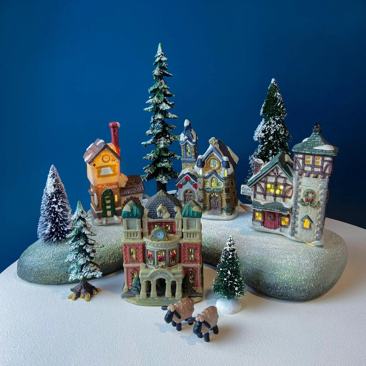 Christmas Village Collection of Small Illuminated Houses | Set of 4 Bldgs: Mill, 2 Churches, Train St., Council Offices, 2 Sheep and 3 Pines | Collectible Vintage | Collectors & Hosts