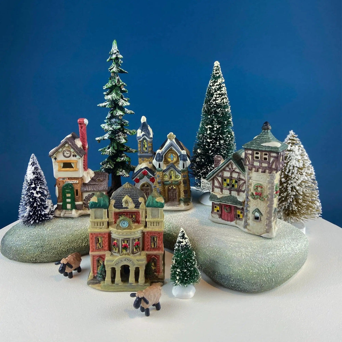 Christmas Village Collection of Small Illuminated Houses | Set of 4 Bldgs: Mill, 2 Churches, Train St., Council Offices, 2 Sheep and 3 Pines | Collectible Vintage | Collectors & Hosts