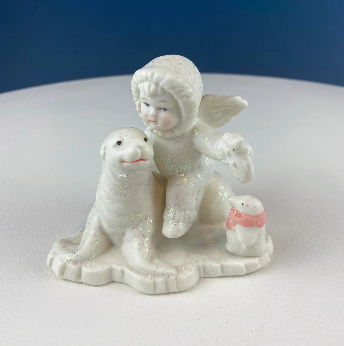 Polar Pals Playing in Snow Under Lit Christmas Tree | 3 White Porcelain Cupid Figurines Celebrating Friendship | Kids Room | Collectors & Hosts